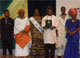 Miscellaneous Photos of 2010: Governor Godswill Akpabio displaying the Award for Infrastructural development of AkwaIbom State and the Passage of the Child Rights Act, by Mboho Akwa Ibom/Northern Ireland