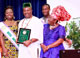 Miscellaneous Photos of 2010: Governor Godswill Akpabio displaying the Award for Infrastructural development of Akwa Ibom State and the Passage of the Child Rights Act, by Mboho Akwa Ibom/Northern Ireland