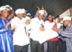 AKS PDP Chairman Prince Uwem Ita Etuk  handing over the governorship result to AKS Governor, Godswill Akpabio (3rd L) flanked by wife Ekaette, Deputy governor elect, Obong Nsima Ekere and the DG campaign organisation Otuekong Idondesit Nkanga